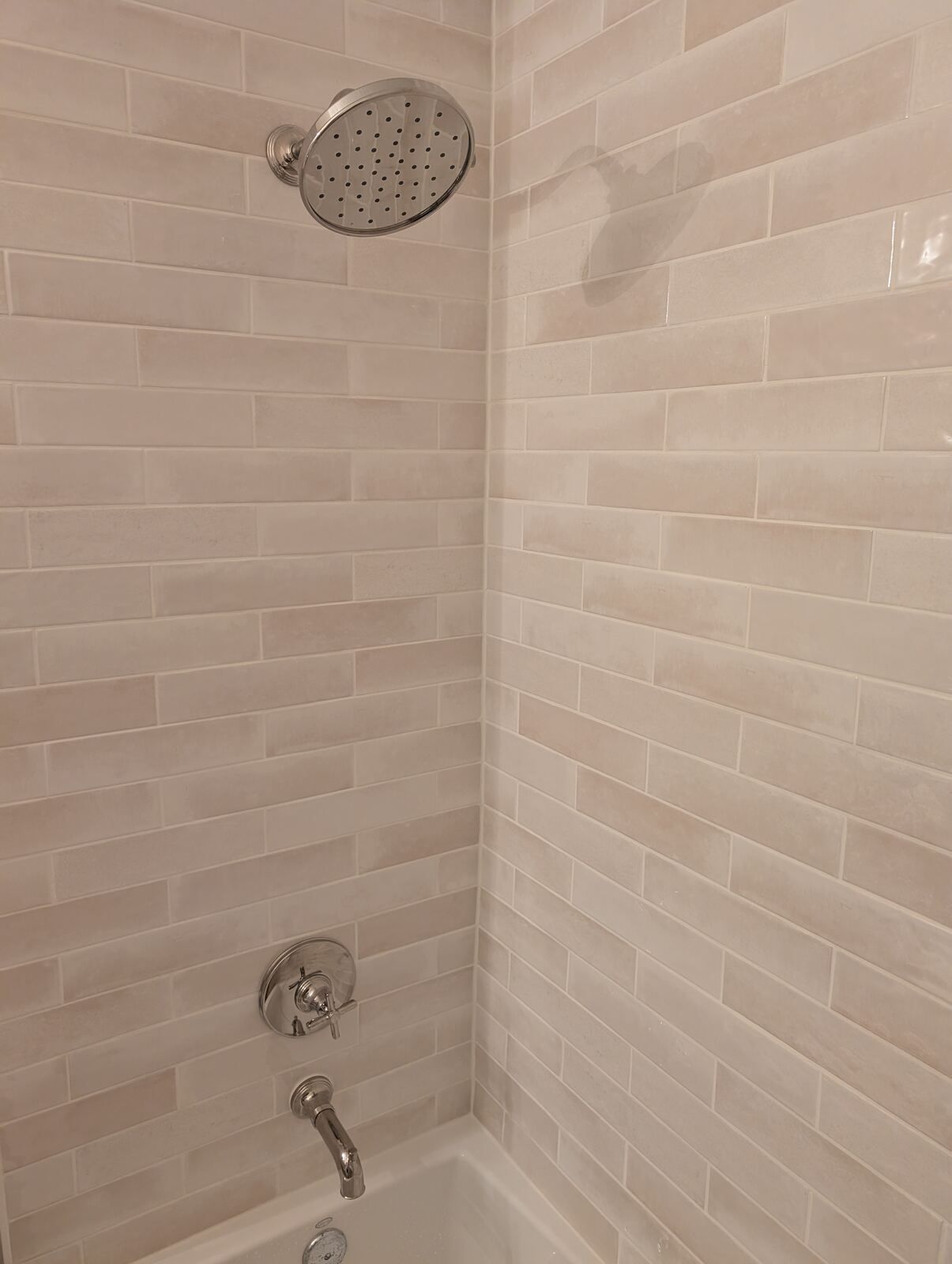Close-up detail of shower tile grout and corner seam in Ponte Vedra bathroom tile installation