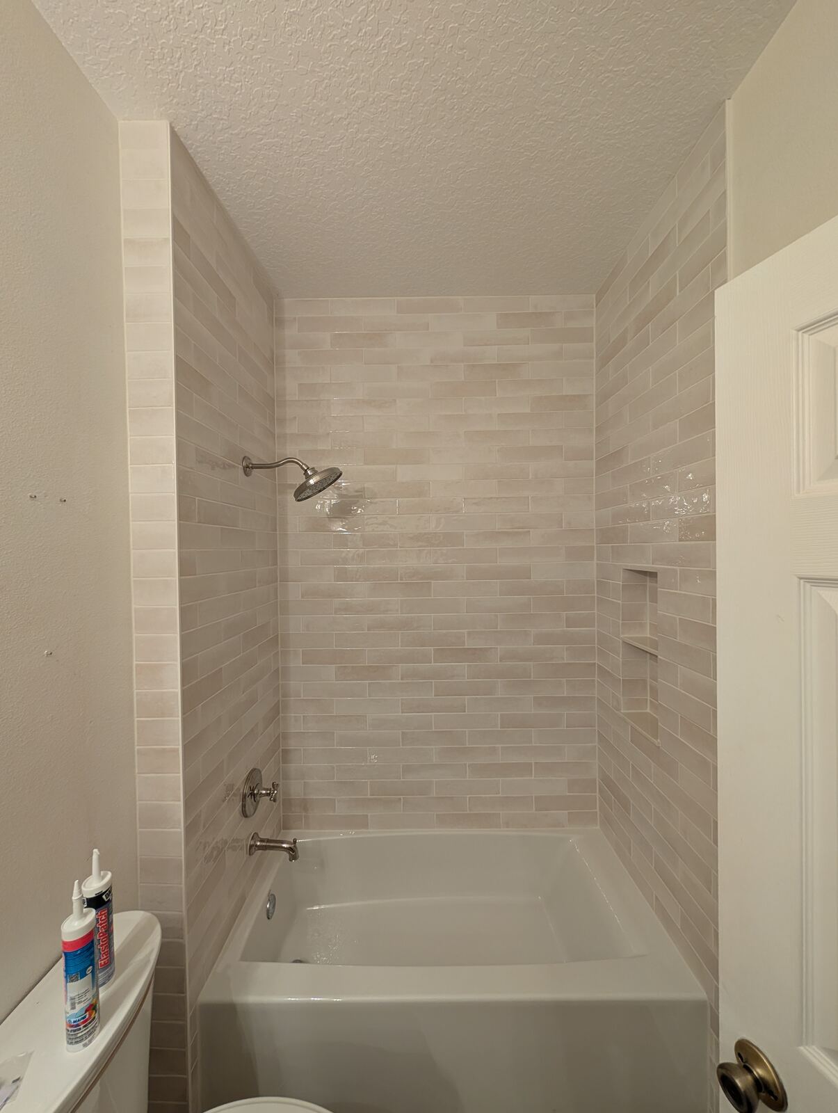 Custom tub and shower surround tile installation in a Ponte Vedra bathroom renovation