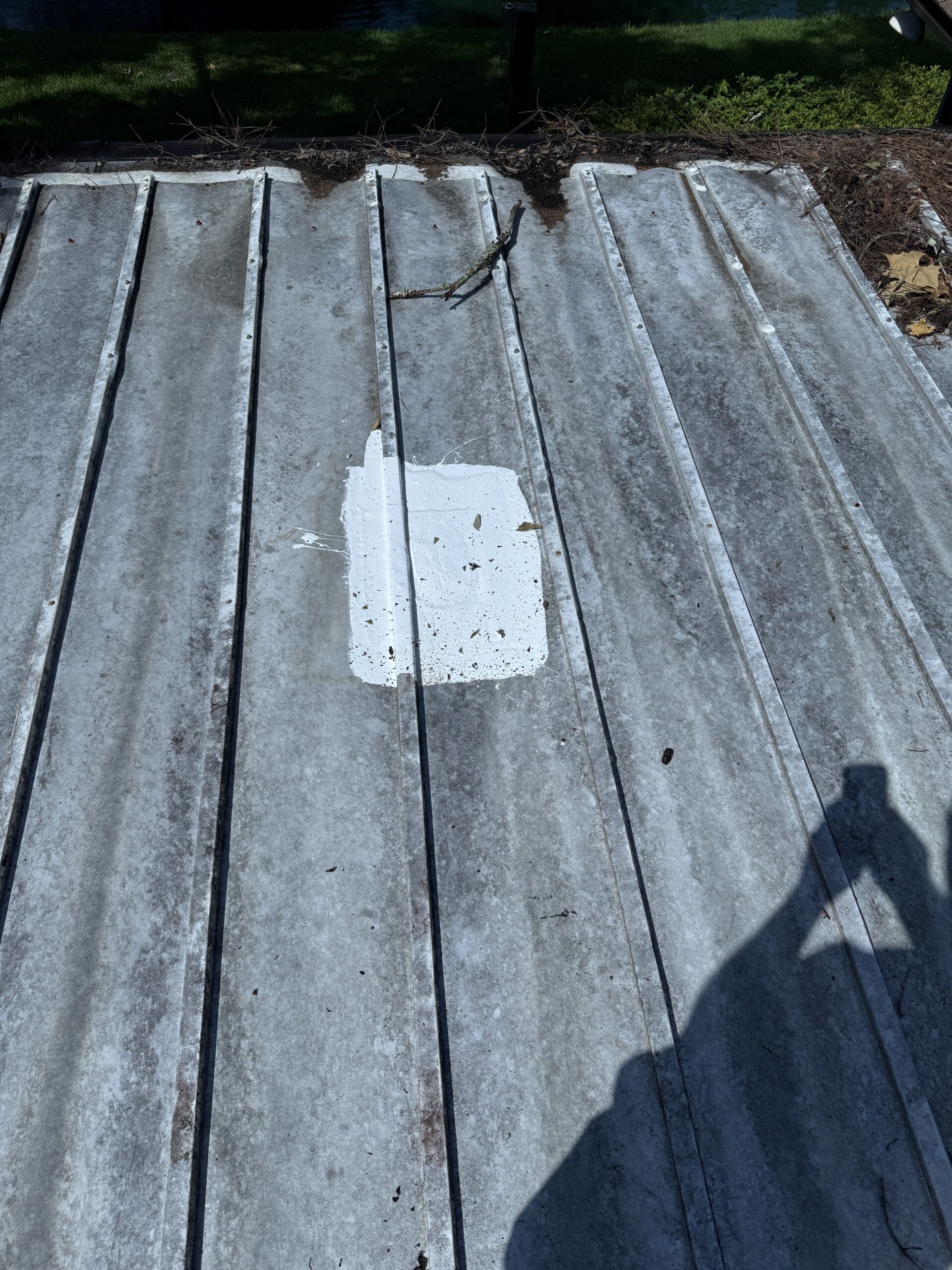 Temporary patch sealing a storm-damaged patio roof after a Jacksonville patio roof patch, view 6