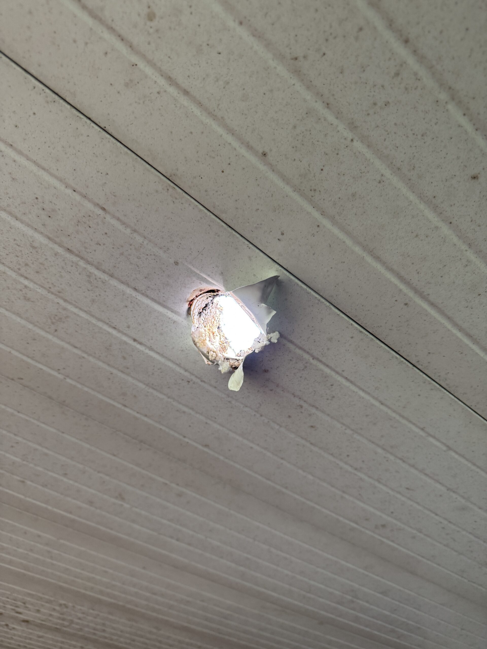Sealing a storm-damaged patio roof during a Jacksonville patio roof patch