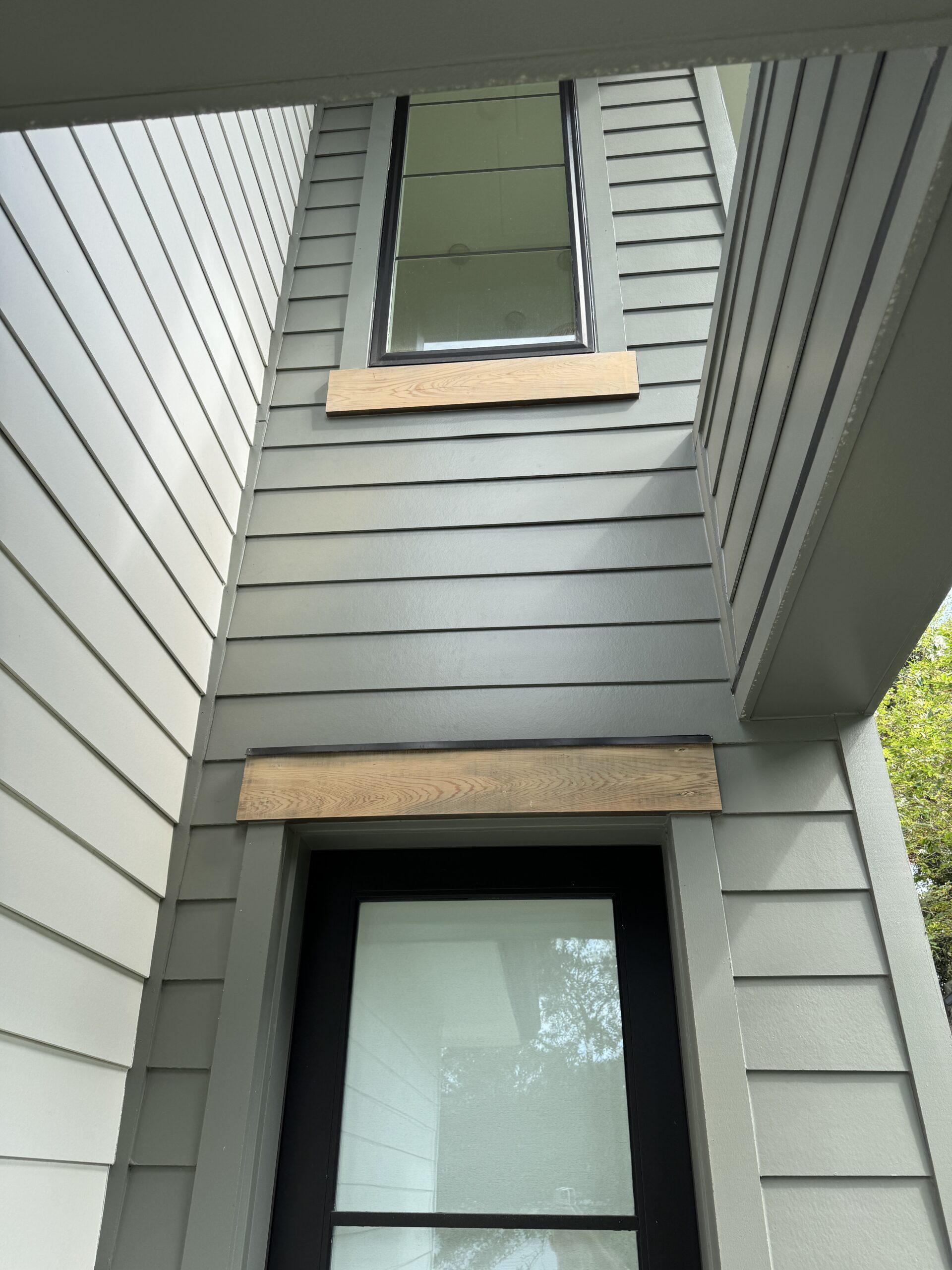 Ponte Vedra Exterior Trim Refinish: Sun-Faded Wood, Sealed and Saved 7 Prepping and caulking exterior trim seams before sealing in a Ponte Vedra home